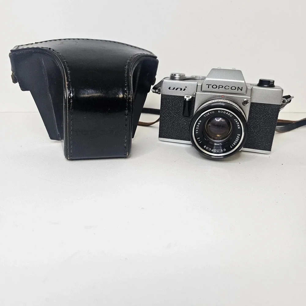 Vintage Topcon Uni 35mm SLR Camera with UV Topcor 53mm f2 Lens and Case Untested